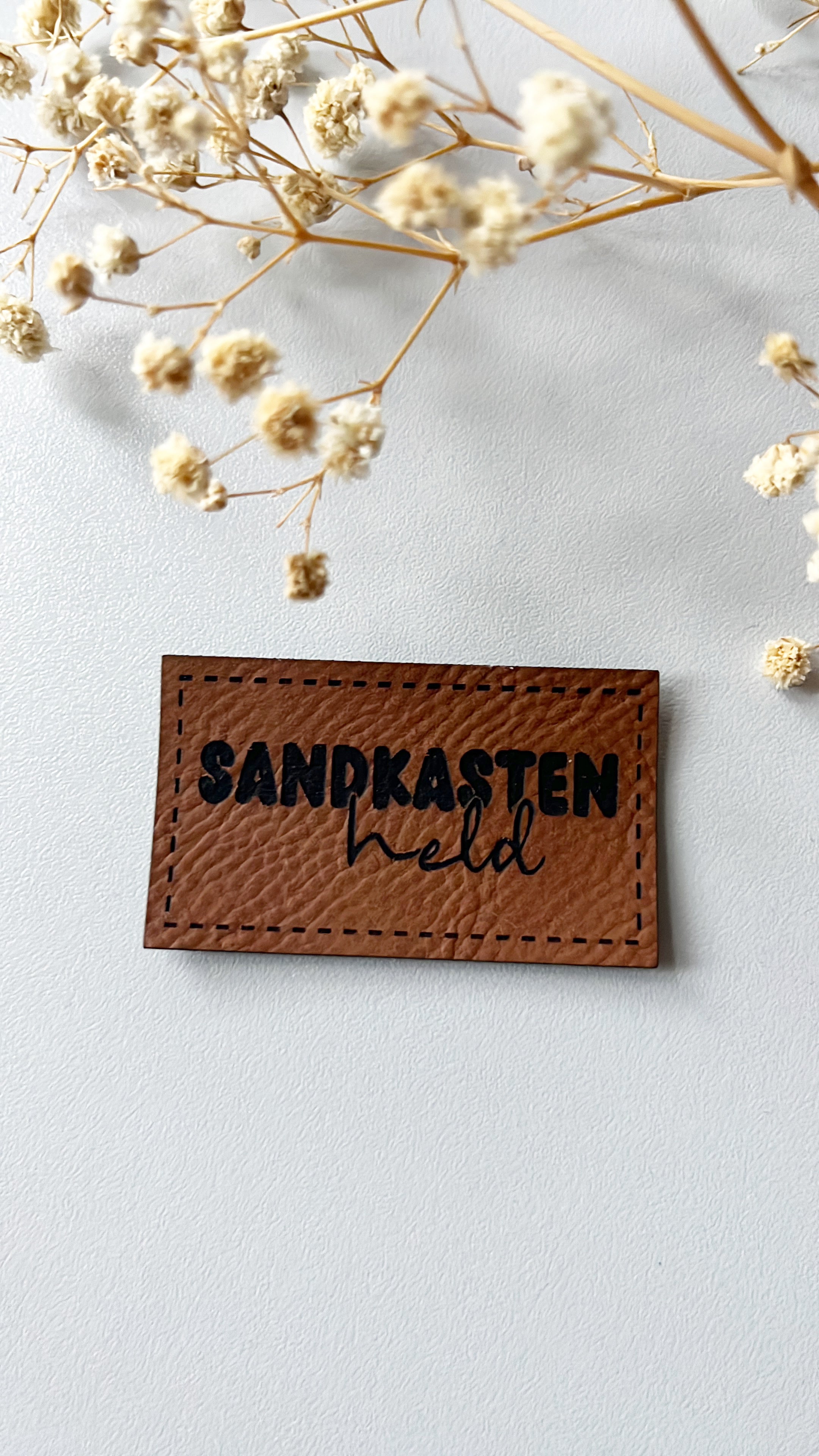 Sandkasten Held Label